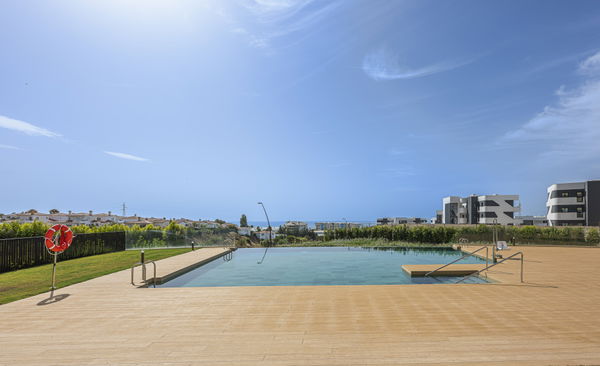Elegant ground floor apartment with expansive terrace in South Residences, Higuerón Resort