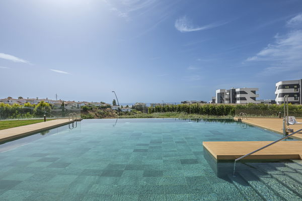 Elegant ground floor apartment with expansive terrace in South Residences, Higuerón Resort