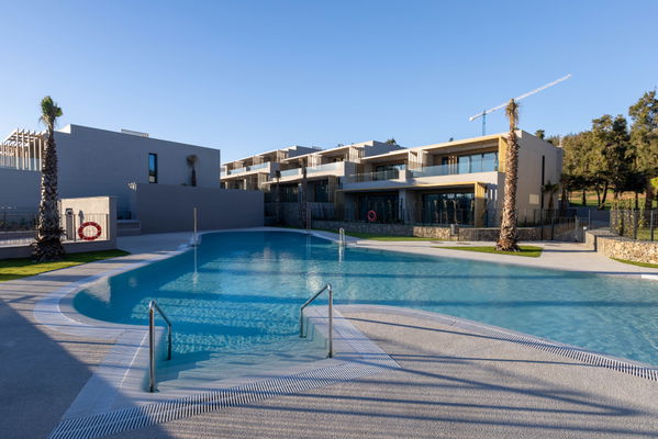 Modern and bright townhouse with spectacular views of a golf course in Reserva del Chaparral, Mijas Costa