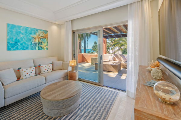 A beachfront penthouse designed around privacy and mediterranean living in La Morera, Marbella East
