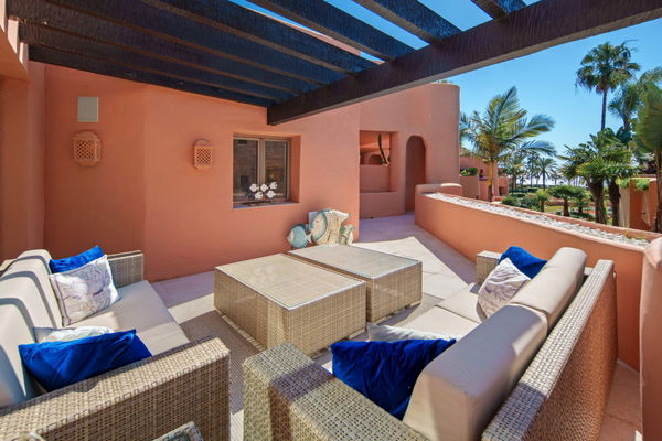 A beachfront penthouse designed around privacy and mediterranean living in La Morera, Marbella East