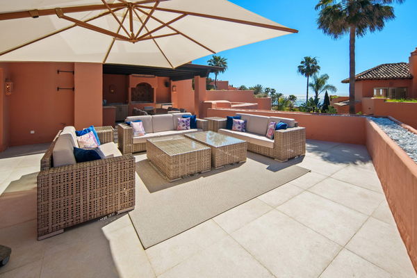 A beachfront penthouse designed around privacy and mediterranean living in La Morera, Marbella East