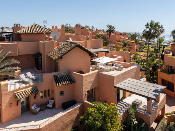 A beachfront penthouse designed around privacy and mediterranean living in La Morera, Marbella East