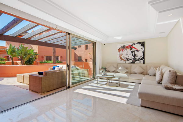 A beachfront penthouse designed around privacy and mediterranean living in La Morera, Marbella East