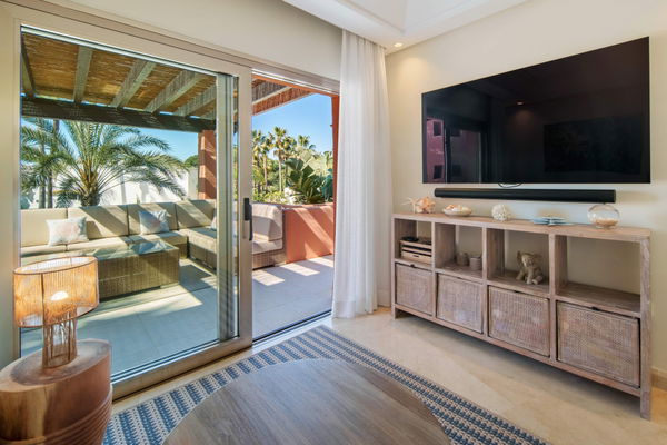 A beachfront penthouse designed around privacy and mediterranean living in La Morera, Marbella East