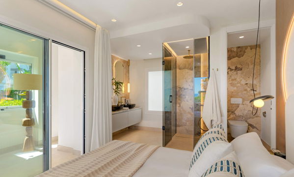 Beachfront contemporary apartment with refined Mediterranean living in Estepona, New Golden Mile