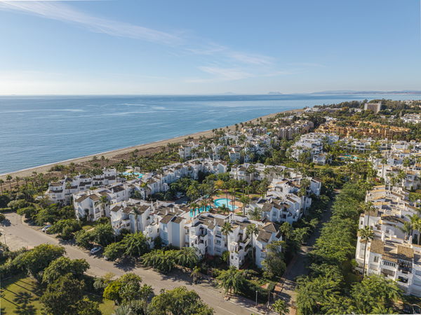 Beachfront contemporary apartment with refined Mediterranean living in Estepona, New Golden Mile
