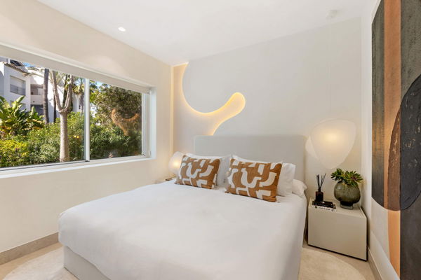 Beachfront contemporary apartment with refined Mediterranean living in Estepona, New Golden Mile