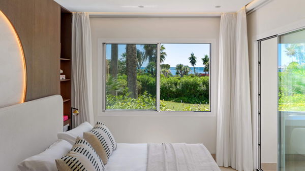 Beachfront contemporary apartment with refined Mediterranean living in Estepona, New Golden Mile