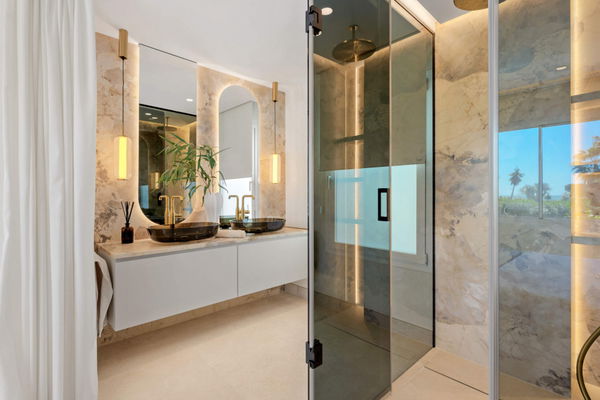 Beachfront contemporary apartment with refined Mediterranean living in Estepona, New Golden Mile
