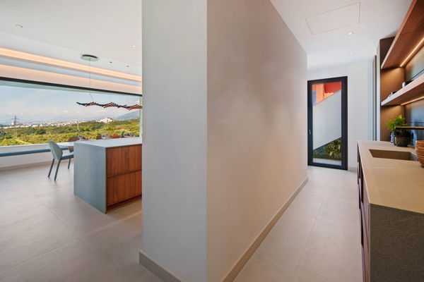 Refined contemporary villa with panoramic sea views in El Rosario, Marbella East