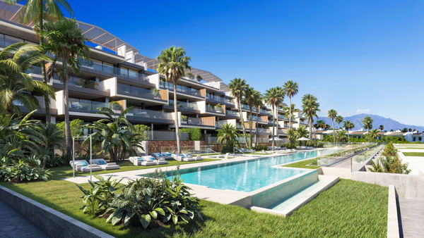 Sophisticated Ground Floor Beachfront Apartment with Private Garden in Manilva