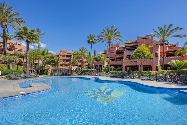 Refined beachfront duplex penthouse with Andalusian elegance, New Golden Mile, Estepona