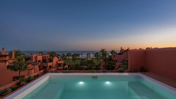 Refined beachfront duplex penthouse with Andalusian elegance, New Golden Mile, Estepona