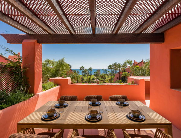Refined beachfront duplex penthouse with Andalusian elegance, New Golden Mile, Estepona