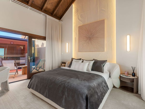 Refined beachfront duplex penthouse with Andalusian elegance, New Golden Mile, Estepona