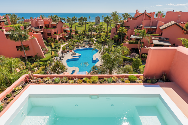 Refined beachfront duplex penthouse with Andalusian elegance, New Golden Mile, Estepona