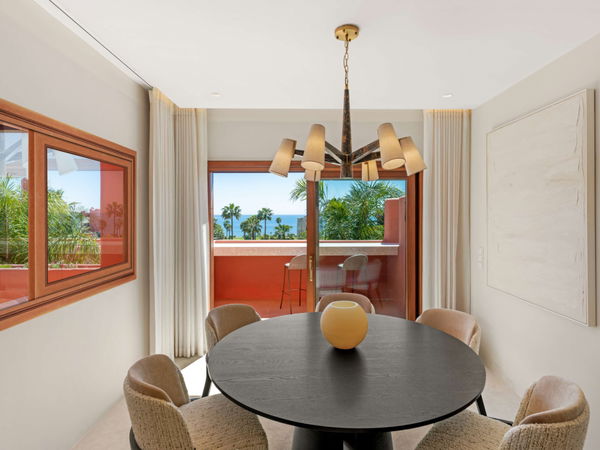 Refined beachfront duplex penthouse with Andalusian elegance, New Golden Mile, Estepona